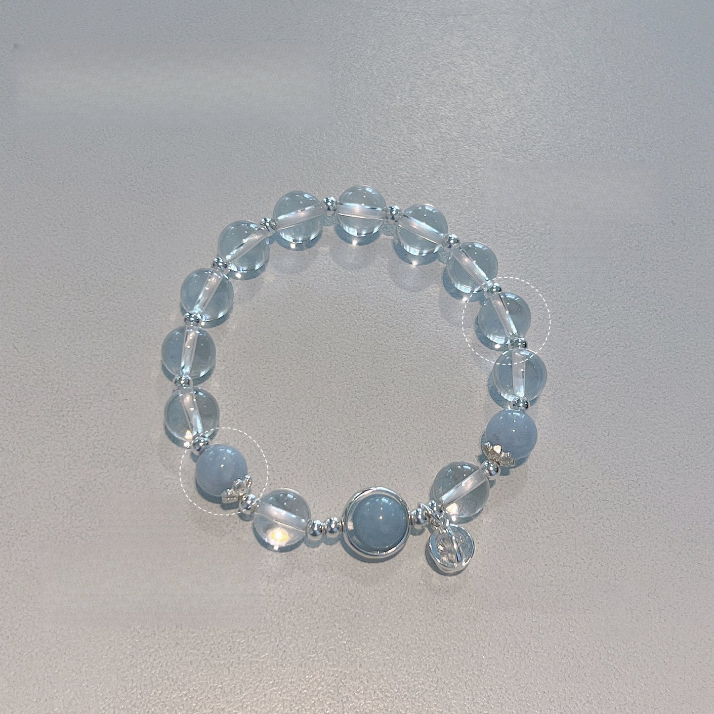 Transport bead bracelet with natural white crystal and blue crystal
