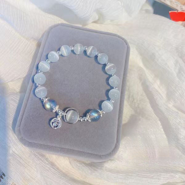 Transport bead bracelet with natural white crystal and blue crystal