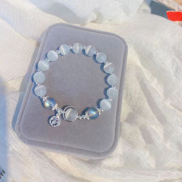 Transport bead bracelet with natural white crystal and blue crystal