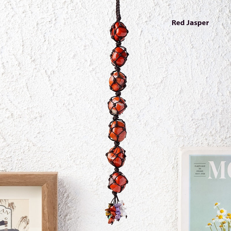 Handmade woven mesh bag with natural crystal, colorful crystal tassel pendant