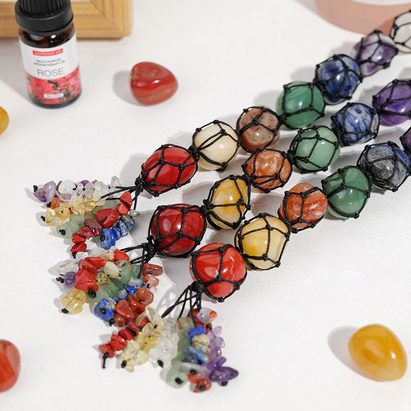 Handmade woven mesh bag with natural crystal, colorful crystal tassel pendant